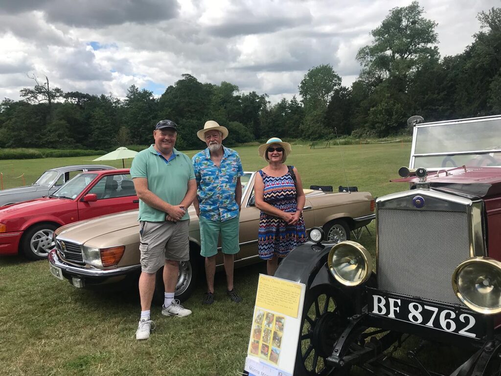 Mark Murphy (left) with classic car owners at the Cobbold 300 Event. Photo: David Vincent