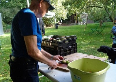 Cutting apples for apple press at Holywells Park Apple Day 2018