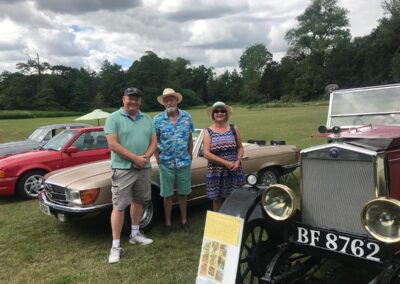 Mark Murphy (left) with classic car owners at the Cobbold 300 Event. Photo: David Vincent